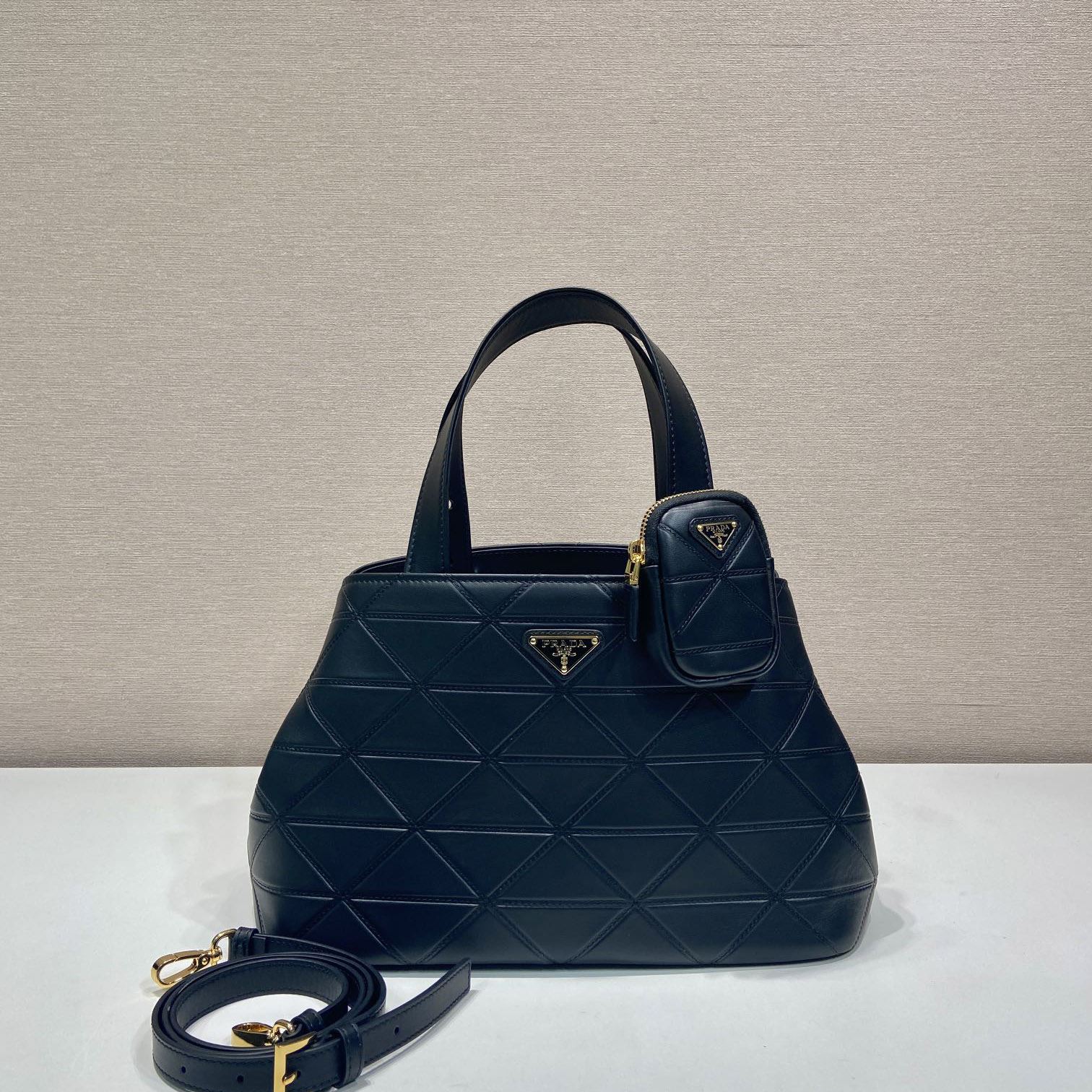 Pra*a top handle bags